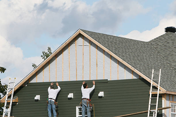 Professional Siding Contractor technician working in Rayland, OH